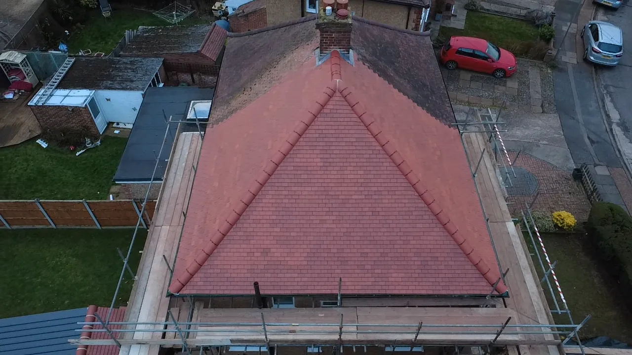 Completed traditional clay tiled roof rebuild in Ashford