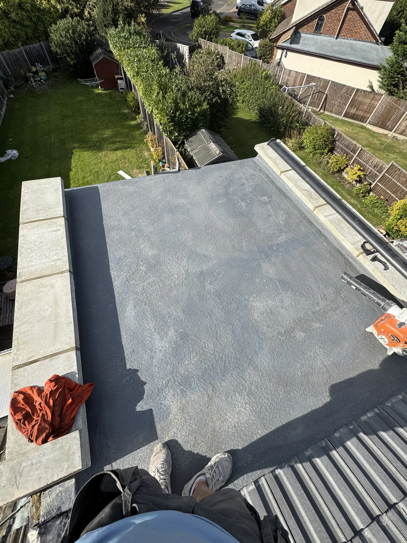 Three layer felt flat roof system in Raynes Park