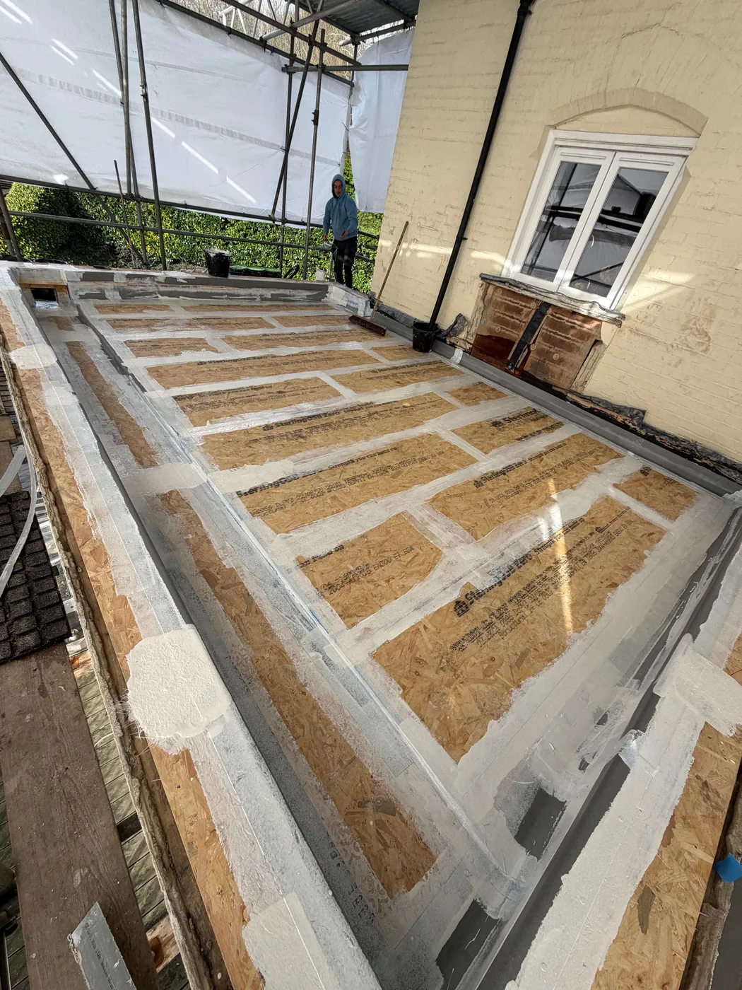 Ventilation route being formed within the Redhill cold-deck flat roof build-up
