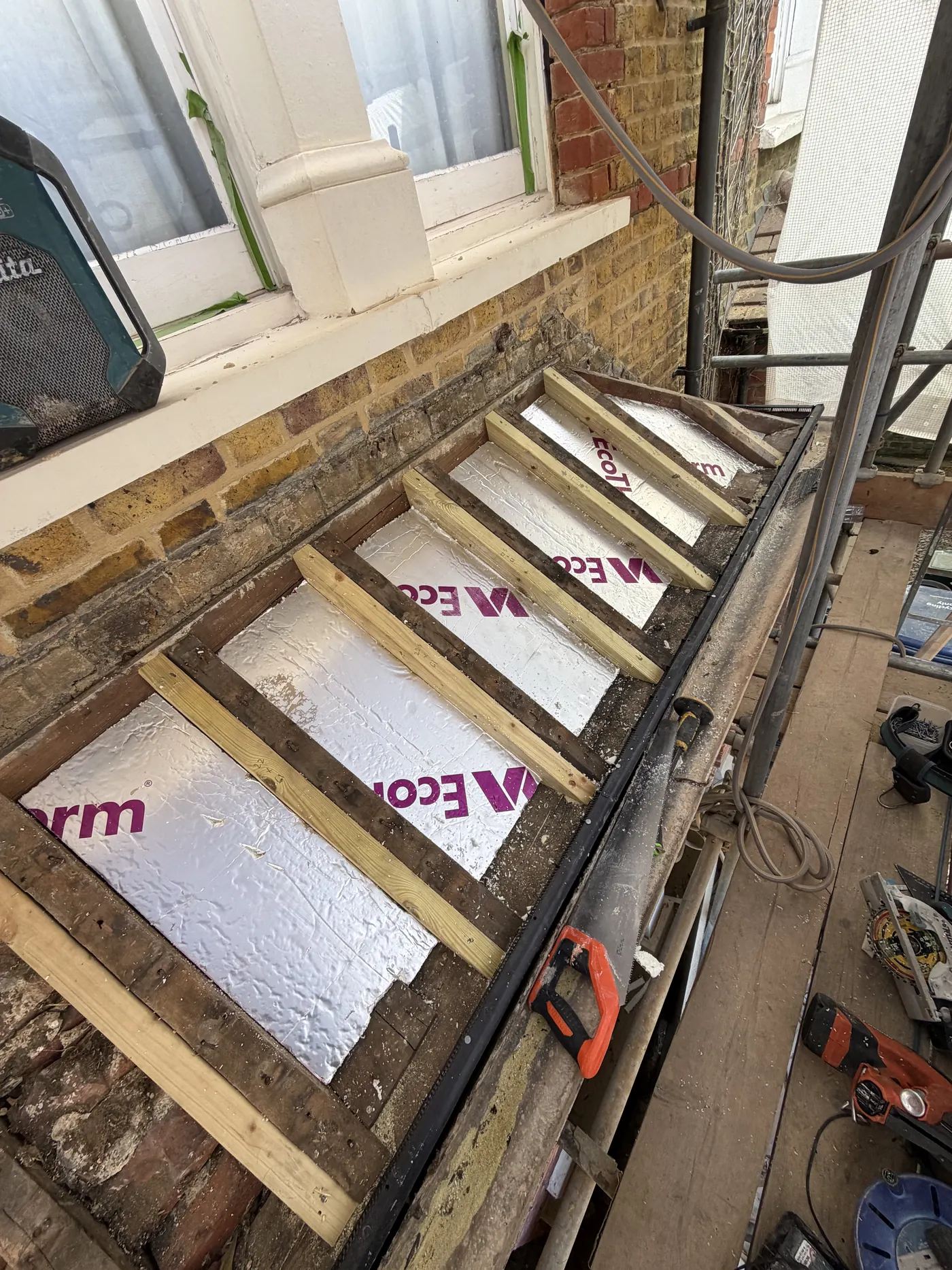 Reinforced C24 timber and Celotex insulation on a Richmond porch roof