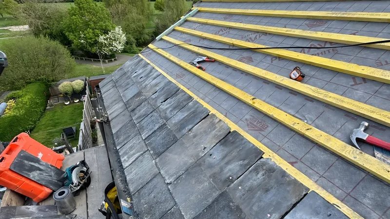 Pitched roof stripped back to prepare for corrective roofing work