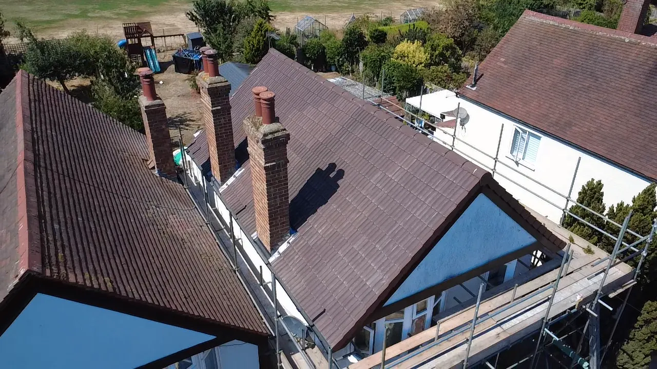 Finished Redland 49 roof with dry ridge, dry verge and chimney detailing