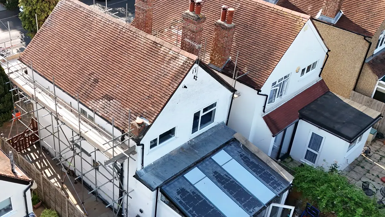 Existing tiled roof before closed-cell spray foam removal and re-roofing