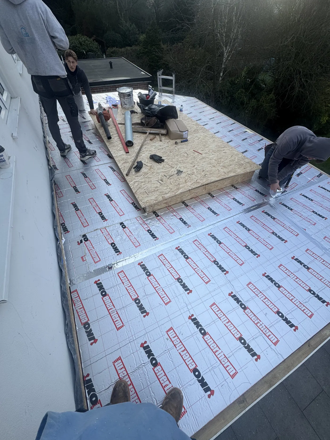 Alutrix vapour control layer and new warm roof deck preparation on a Sunbury flat roof