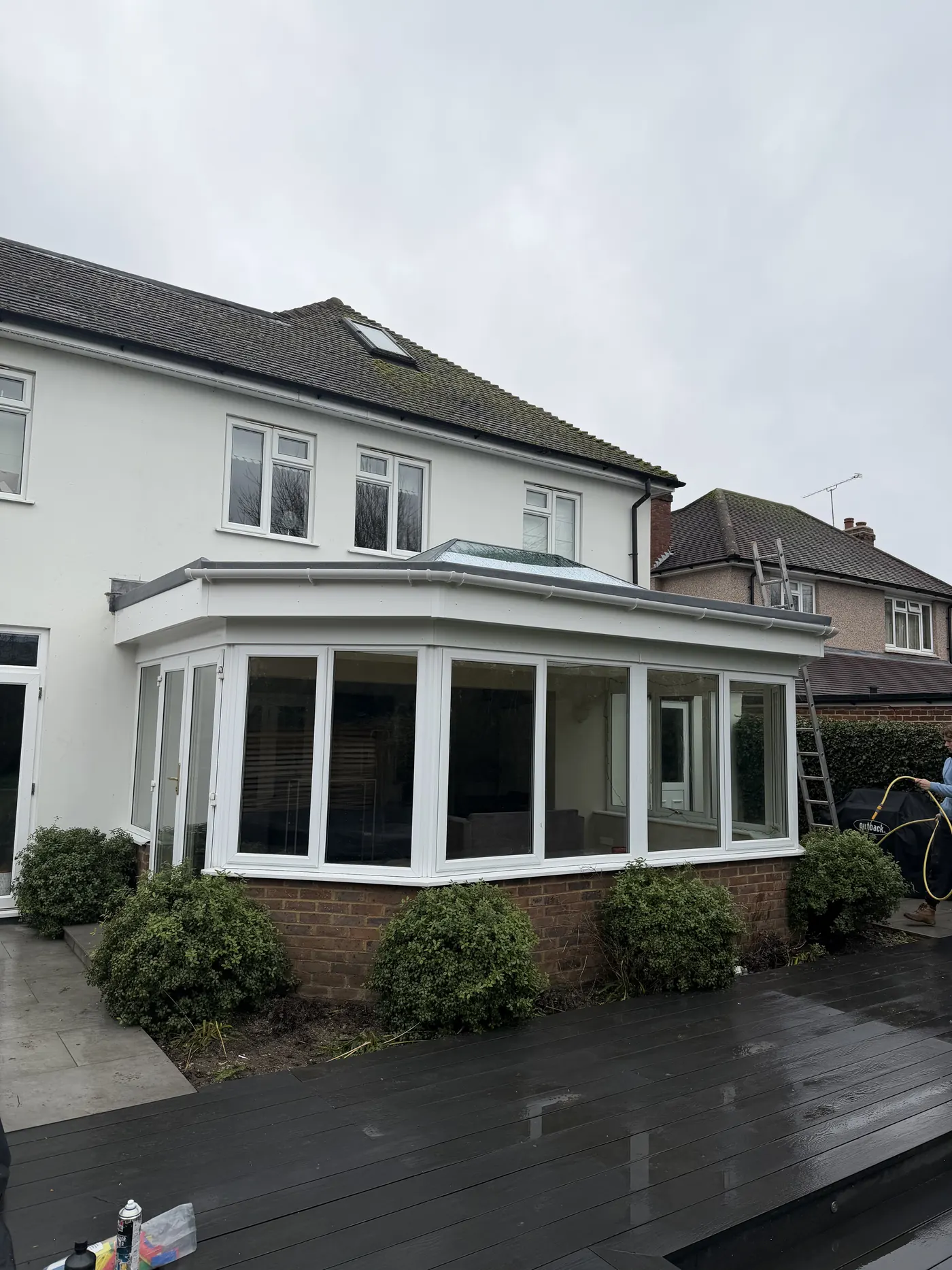 Exterior view of the completed Sunbury extension roof with new UPVC fascia soffit gutters and roof lantern