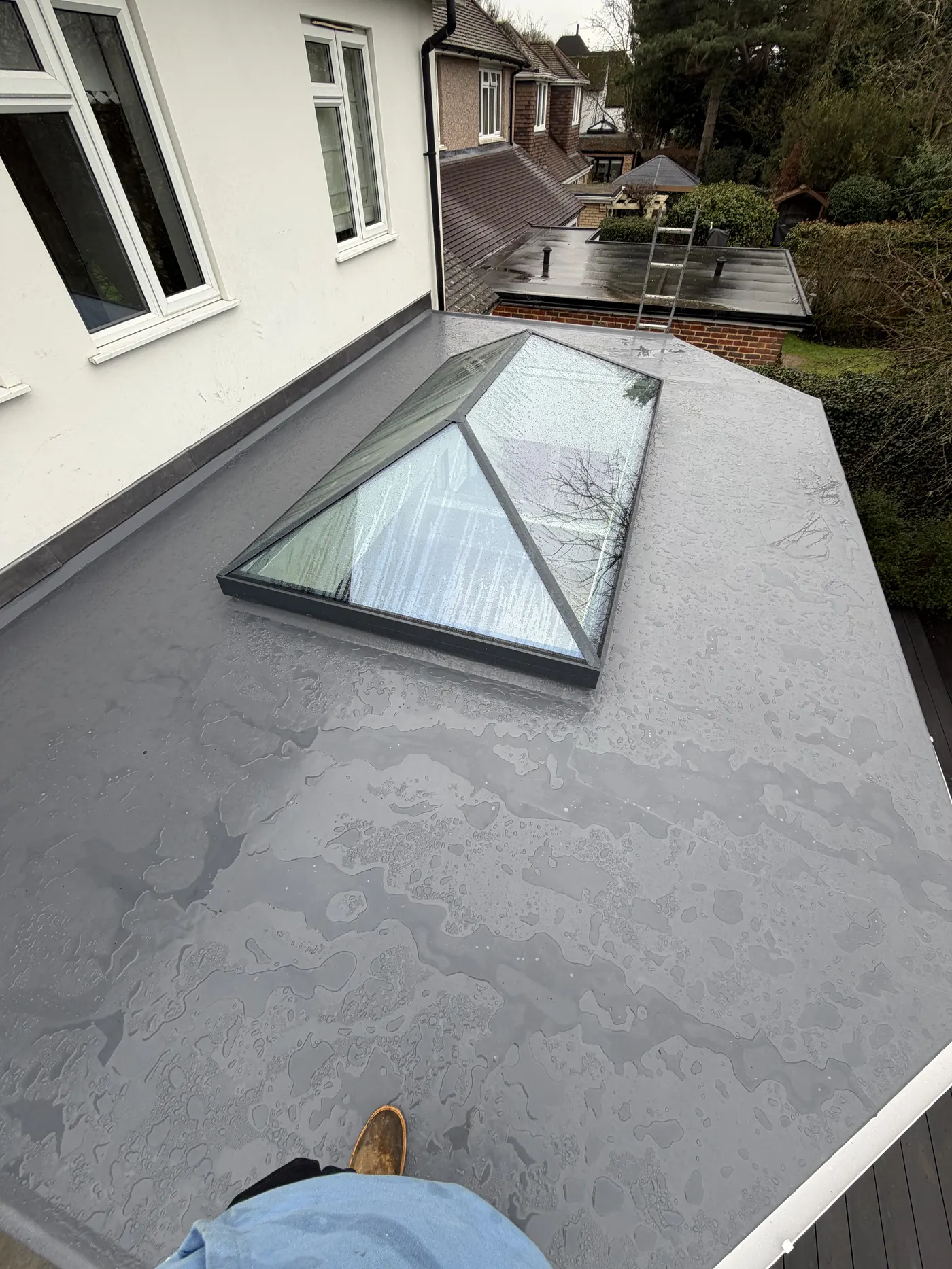 Completed Sunbury flat roof seen from above with the new rectangular roof lantern
